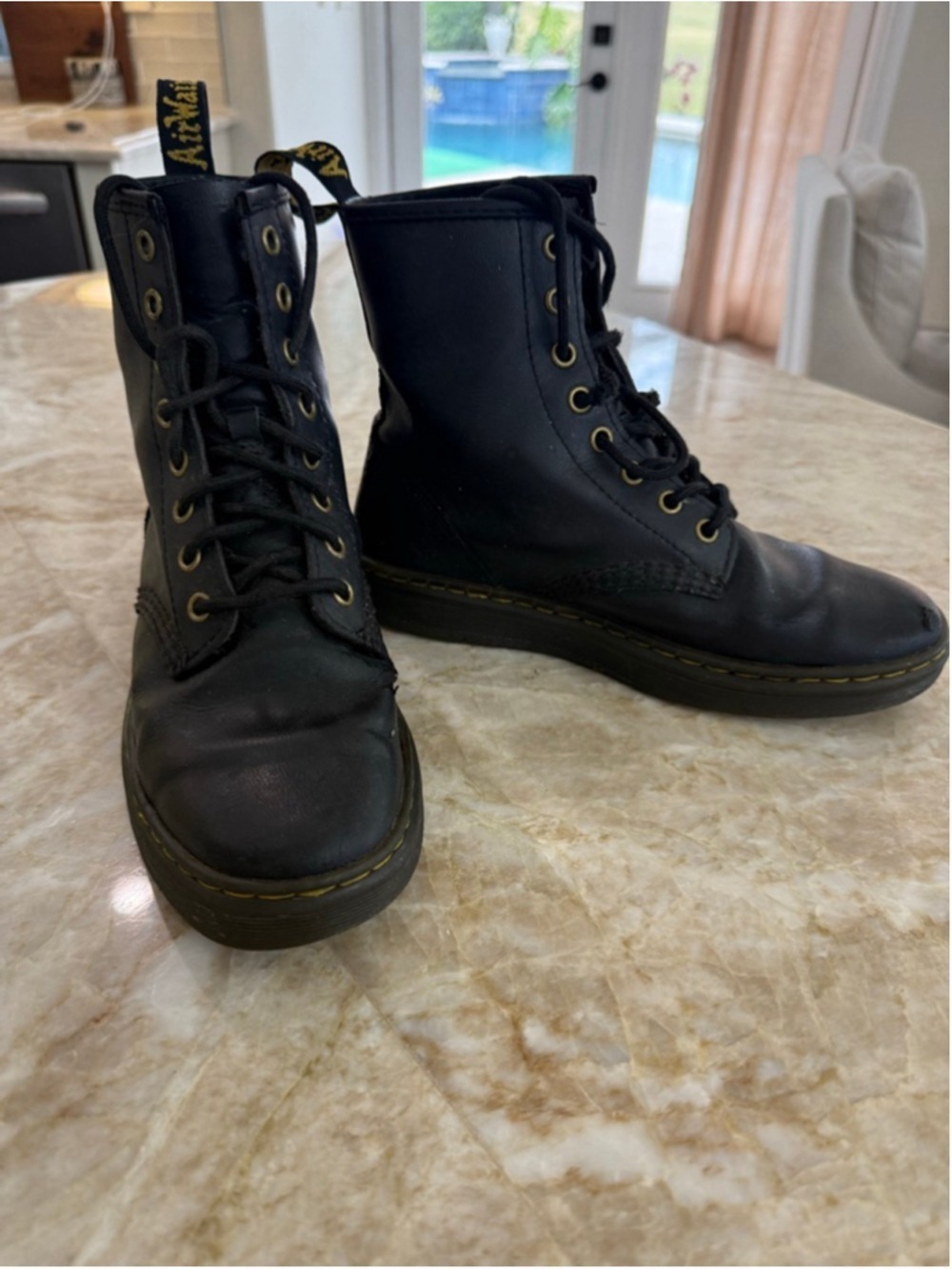 Women's Dr. Martens Black Lace Up Boots Size 7 with Yellow Accents, holes.
